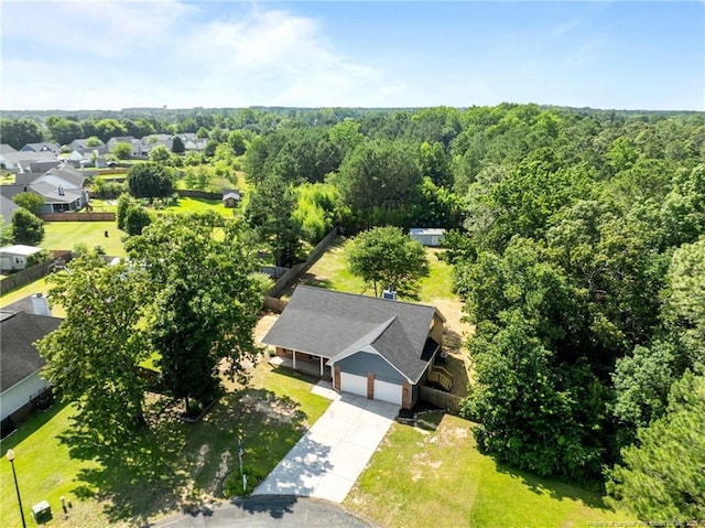 107 Beaumont Ct, Raeford, NC 28376 - aerial view of property and surrounding area featuring a heavily wooded area
