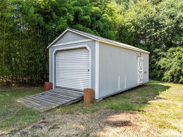107 Beaumont Ct, Raeford, NC 28376 - garage with a forest view