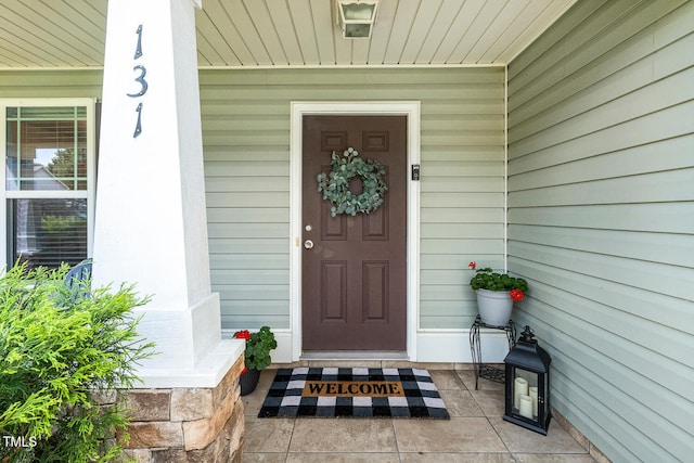 131 Abacos Ct, Clayton, NC 27520 - doorway to property featuring a porch