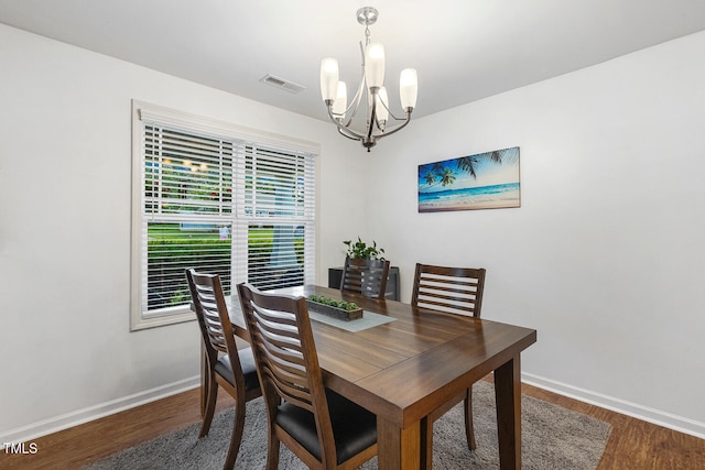 131 Abacos Ct, Clayton, NC 27520 - dining space featuring a chandelier and wood finished floors