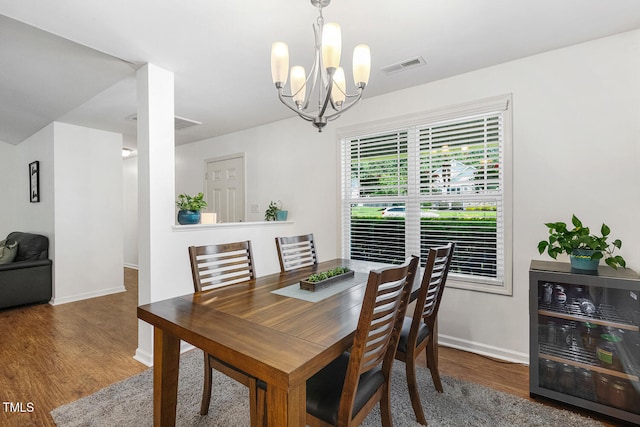 131 Abacos Ct, Clayton, NC 27520 - dining space with wood finished floors and a chandelier