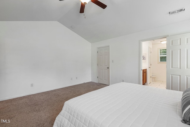 131 Abacos Ct, Clayton, NC 27520 - carpeted bedroom with vaulted ceiling, ensuite bath, and ceiling fan