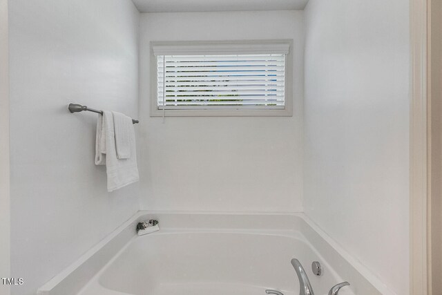131 Abacos Ct, Clayton, NC 27520 - full bathroom featuring a garden tub
