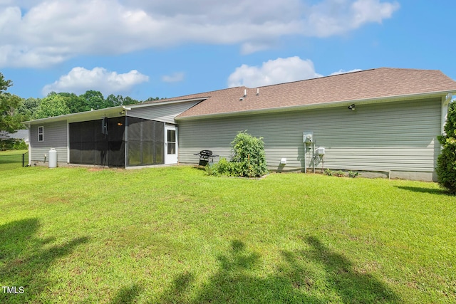 131 Abacos Ct, Clayton, NC 27520 - back of house with a sunroom and a lawn