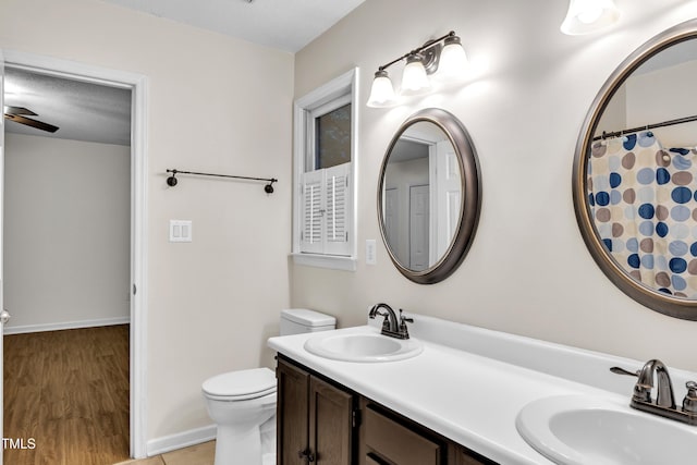 8 Great Oak Ct, Durham, NC 27713 - full bath with double vanity and wood finished floors