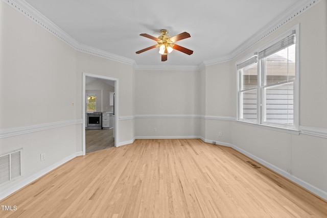 6008 Chittim Ct, Raleigh, NC 27616 - spare room with ceiling fan, light wood finished floors, crown molding, and baseboards