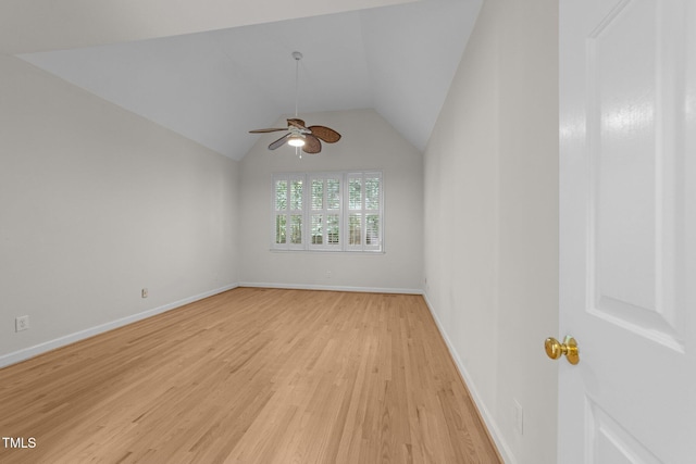 6008 Chittim Ct, Raleigh, NC 27616 - empty room featuring light wood finished floors, ceiling fan, baseboards, and vaulted ceiling