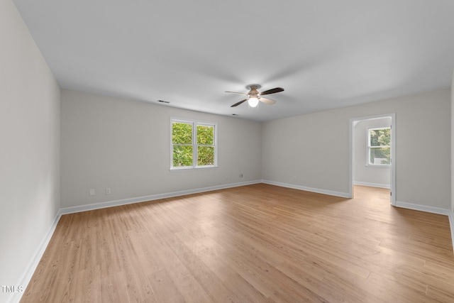 6008 Chittim Ct, Raleigh, NC 27616 - unfurnished room featuring plenty of natural light, a ceiling fan, and baseboards