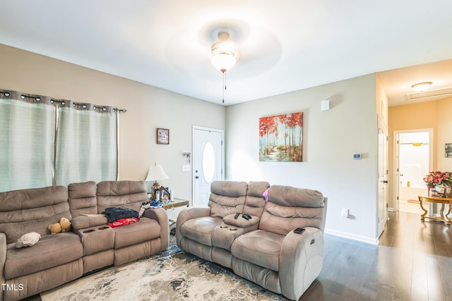 54 Lockwood Dr, Clayton, NC 27527 - living room featuring wood finished floors, ceiling fan, and baseboards
