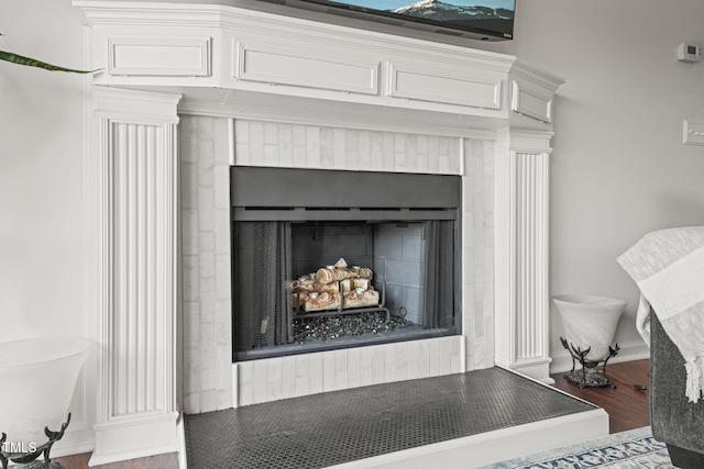 65 The Moorings Unit 65, Clarksville, VA 23927 - detailed view of a fireplace and wood finished floors