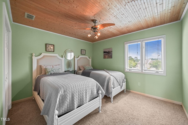 65 The Moorings Unit 65, Clarksville, VA 23927 - bedroom with carpet, baseboards, wooden ceiling, ornamental molding, and a ceiling fan