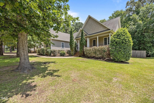 44 Supreme Dr, Lillington, NC 27546 - view of front of home with roof with shingles