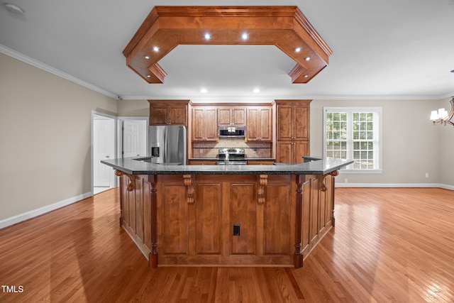 44 Supreme Dr, Lillington, NC 27546 - kitchen featuring appliances with stainless steel finishes, a kitchen bar, crown molding, light wood-style floors, and brown cabinetry