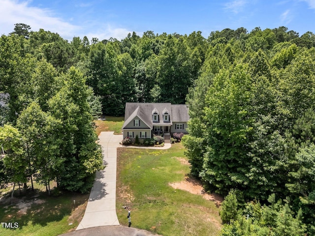 45 Chaucer Ct W, Zebulon, NC 27597 - view of subject property featuring a forest