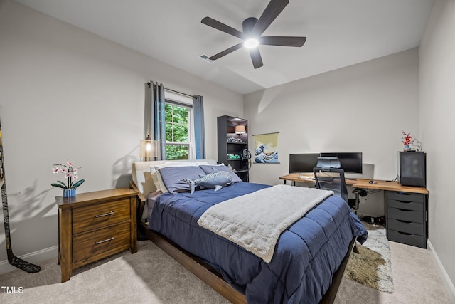 45 Chaucer Ct W, Zebulon, NC 27597 - bedroom with light carpet, baseboards, an office area, and ceiling fan