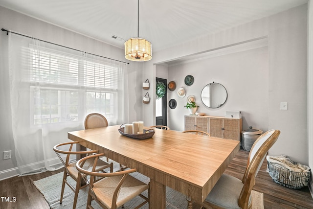 947 Weatherby Ln, Creedmoor, NC 27522 - dining area featuring a chandelier and dark wood-type flooring