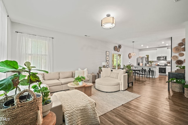 947 Weatherby Ln, Creedmoor, NC 27522 - living area with dark wood-type flooring and recessed lighting