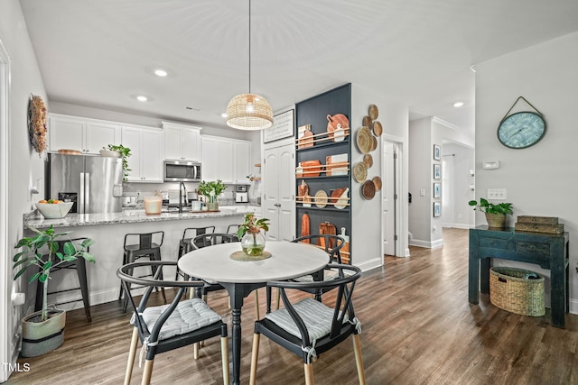 947 Weatherby Ln, Creedmoor, NC 27522 - dining room with dark wood-style flooring and recessed lighting