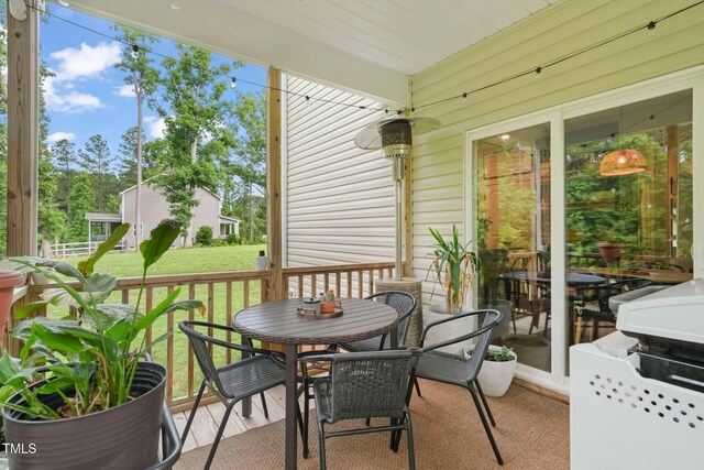 947 Weatherby Ln, Creedmoor, NC 27522 - sunroom featuring outdoor dining area