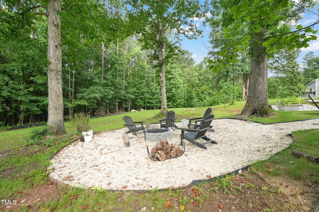 947 Weatherby Ln, Creedmoor, NC 27522 - view of patio / terrace featuring an outdoor fire pit