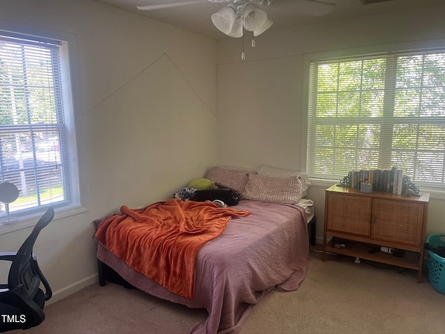 2000 University Woods Rd Unit 203, Raleigh, NC 27603 - bedroom with carpet floors and ceiling fan