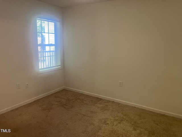 2000 University Woods Rd Unit 203, Raleigh, NC 27603 - carpeted spare room featuring baseboards