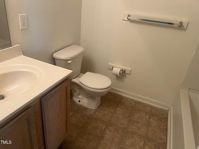 2000 University Woods Rd Unit 203, Raleigh, NC 27603 - bathroom with vanity, toilet, tile patterned flooring, and baseboards