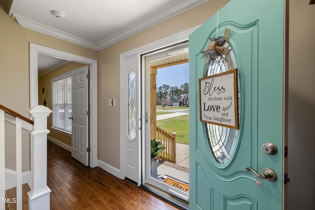 317 Hunters Creek Dr, Goldsboro, NC 27534 - foyer featuring dark wood-style flooring, healthy amount of natural light, crown molding, baseboards, and stairs