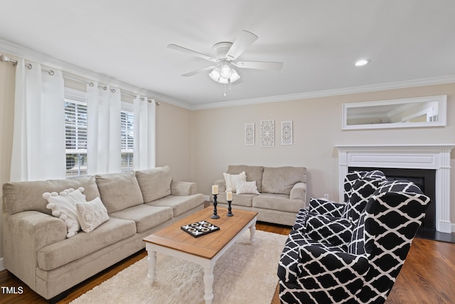 317 Hunters Creek Dr, Goldsboro, NC 27534 - living room featuring crown molding, wood finished floors, ceiling fan, a fireplace, and recessed lighting