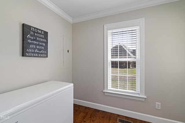 317 Hunters Creek Dr, Goldsboro, NC 27534 - hall with healthy amount of natural light, crown molding, electric panel, baseboards, and dark wood finished floors