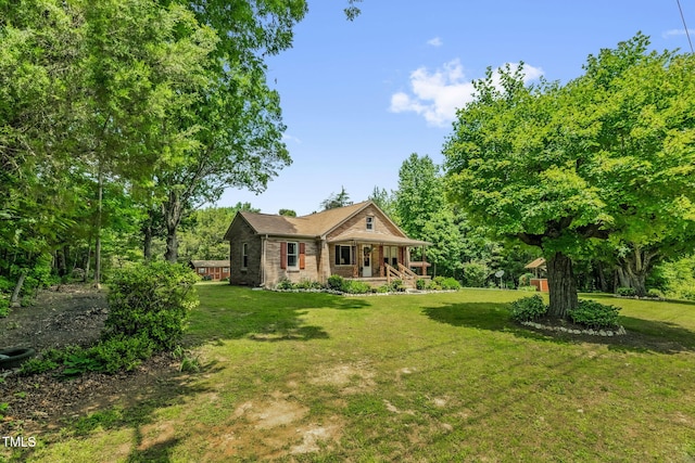 3315 Mebane Oaks Rd, Mebane, NC 27302 - view of front facade with covered porch, a front yard, and brick siding