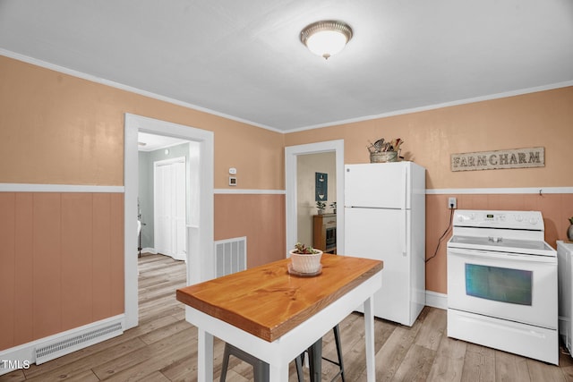 3315 Mebane Oaks Rd, Mebane, NC 27302 - kitchen with white appliances, light wood-type flooring, ornamental molding, and wainscoting