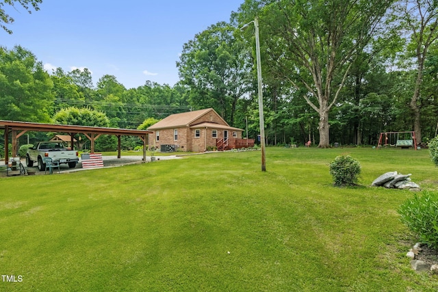 3315 Mebane Oaks Rd, Mebane, NC 27302 - view of grassy yard featuring a detached carport