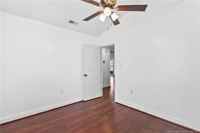 604 S Buckeye Dr, Raeford, NC 28376 - empty room with dark wood finished floors, baseboards, lofted ceiling, a ceiling fan, and a smoke detector
