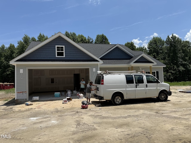 4024 N NC-581 Hwy, Kenly, NC 27542 - view of front of home featuring an attached garage and a shingled roof
