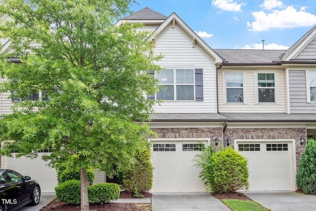 140 Token House Rd, Durham, NC 27703 - view of property with a garage, stone siding, driveway, and roof with shingles
