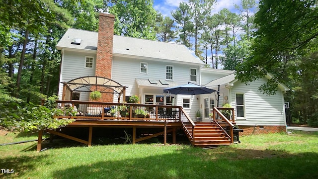 12037 Deer Run, Raleigh, NC 27614 - rear view of property with a lawn, a wooden deck, and a chimney