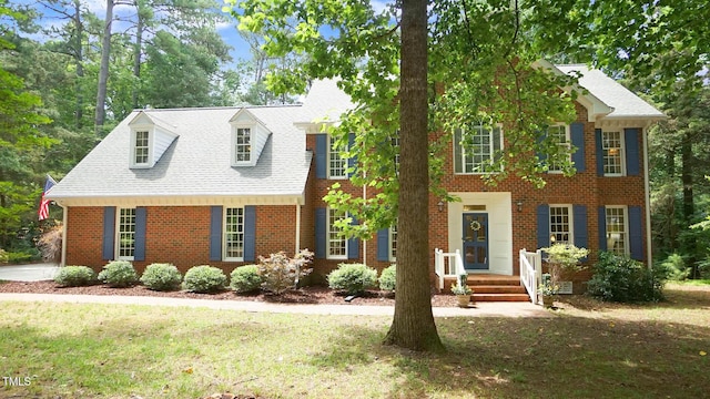 12037 Deer Run, Raleigh, NC 27614 - view of front of property featuring a front lawn, brick siding, and roof with shingles