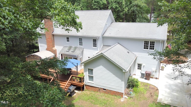 12037 Deer Run, Raleigh, NC 27614 - rear view of house featuring a deck, a chimney, a shingled roof, and crawl space