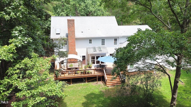 12037 Deer Run, Raleigh, NC 27614 - rear view of property with a wooden deck, a lawn, and a chimney