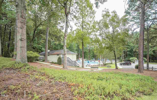 12037 Deer Run, Raleigh, NC 27614 - view of yard with an outdoor pool