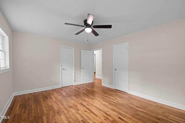 105 Hanna St, Carrboro, NC 27510 - unfurnished bedroom with light wood-type flooring and a ceiling fan