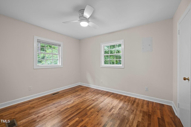 105 Hanna St, Carrboro, NC 27510 - empty room featuring plenty of natural light, hardwood / wood-style floors, and a ceiling fan