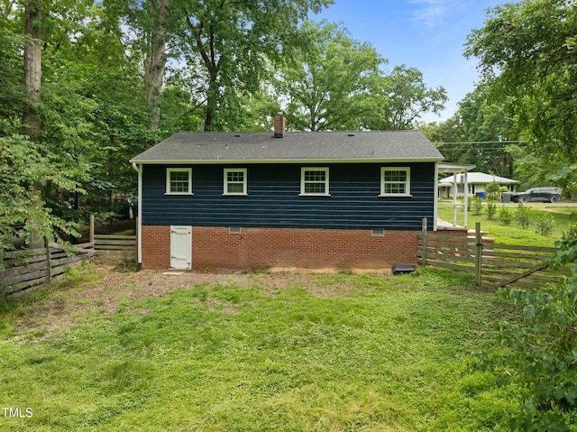 105 Hanna St, Carrboro, NC 27510 - back of house with a chimney