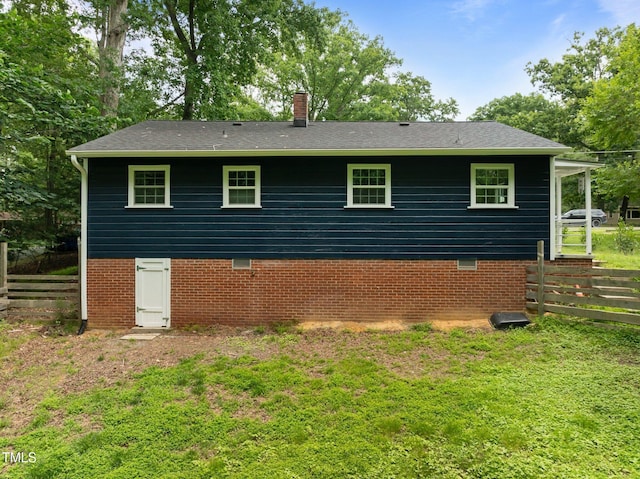 105 Hanna St, Carrboro, NC 27510 - view of side of home with a chimney