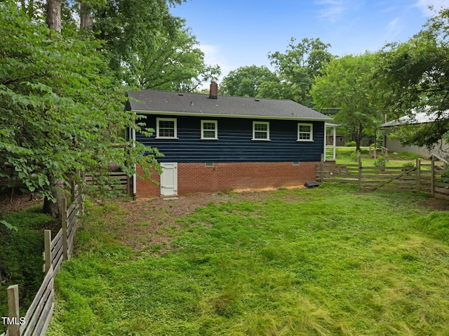 105 Hanna St, Carrboro, NC 27510 - rear view of property featuring a chimney