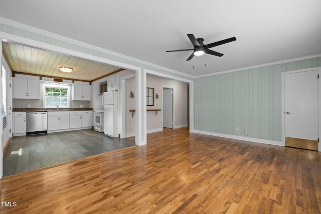 105 Hanna St, Carrboro, NC 27510 - unfurnished living room featuring ornamental molding, dark wood-style flooring, and a ceiling fan