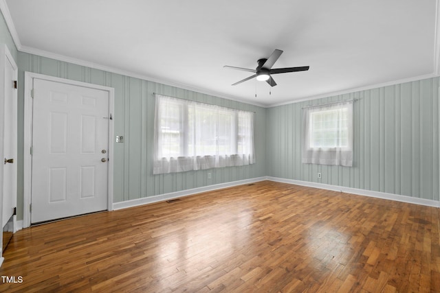 105 Hanna St, Carrboro, NC 27510 - foyer entrance featuring crown molding, ceiling fan, and wood finished floors