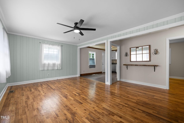105 Hanna St, Carrboro, NC 27510 - unfurnished room with ornamental molding, ceiling fan, and wood finished floors