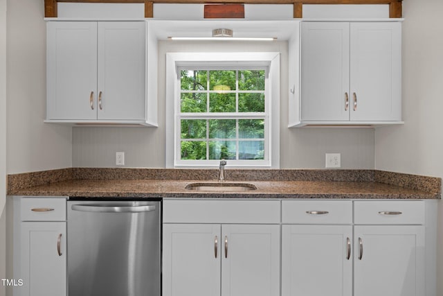 105 Hanna St, Carrboro, NC 27510 - kitchen featuring dishwasher, white cabinetry, and dark stone counters